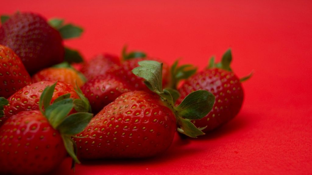 Strawberries with velvet red background strawberry desktop wallpaper