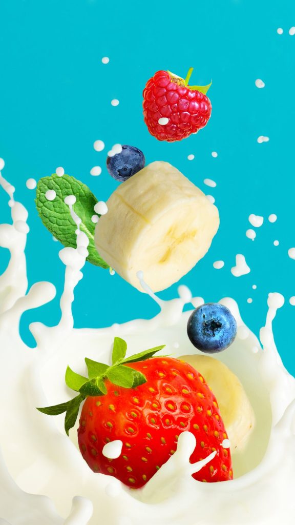 Strawberry with fruits and milk and sky background strawberry phone wallpaper