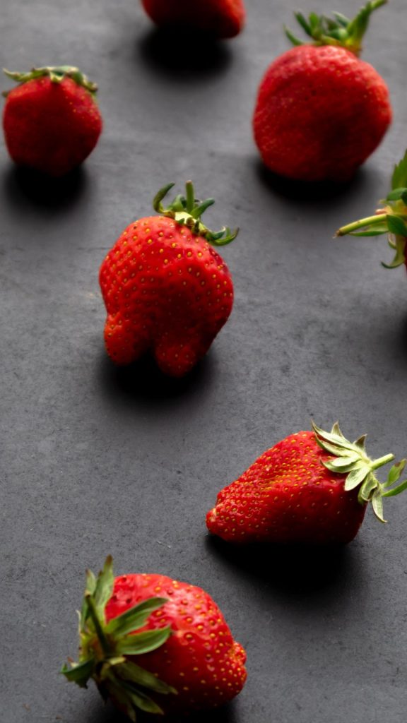 Vintage red strawberries on grey background strawberry phone wallpaper