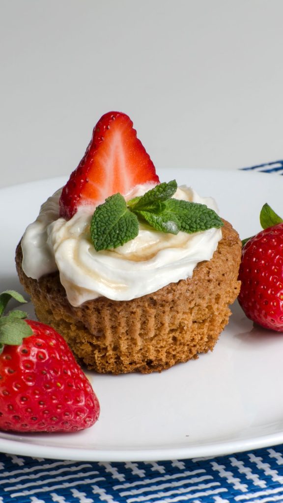 Chocolate flavoured cake with cream and strawberries with plain white background strawberry shortcake wallpaper