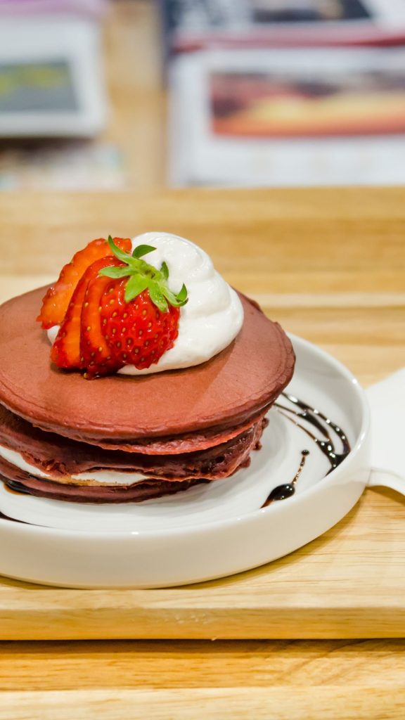 Chocolate flavoured pancake with cream and strawberries strawberry shortcake wallpaper