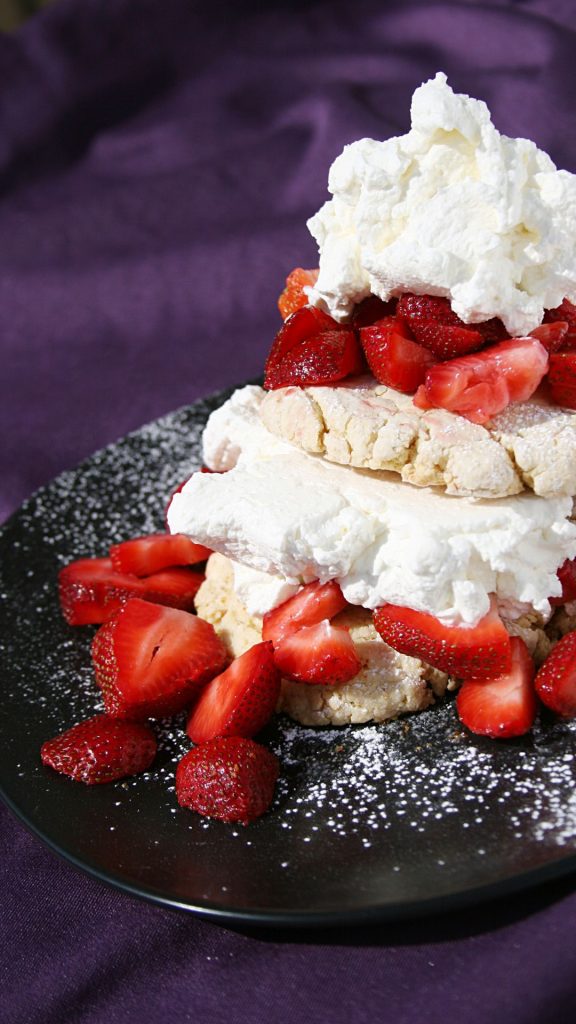 Cookies with strawberries and cream with blurred purple background strawberry shortcake wallpaper