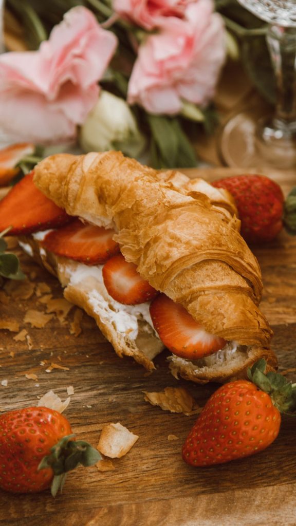Croissant with strawberries pastel pink strawberry wallpaper