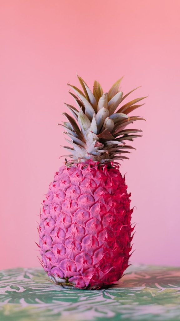 Cute pineapple in pink colour with plain pink background Pineapple wallpaper