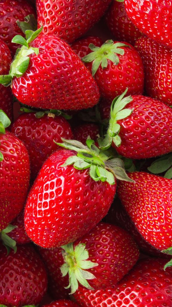 Farm fresh red juicy strawberries with green strawberry caps strawberry wallpaper for I phone