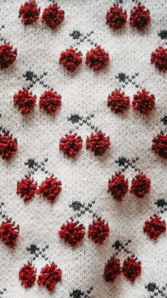 Knitted strawberries on knitted white fabric aesthetic cherry wallpapers