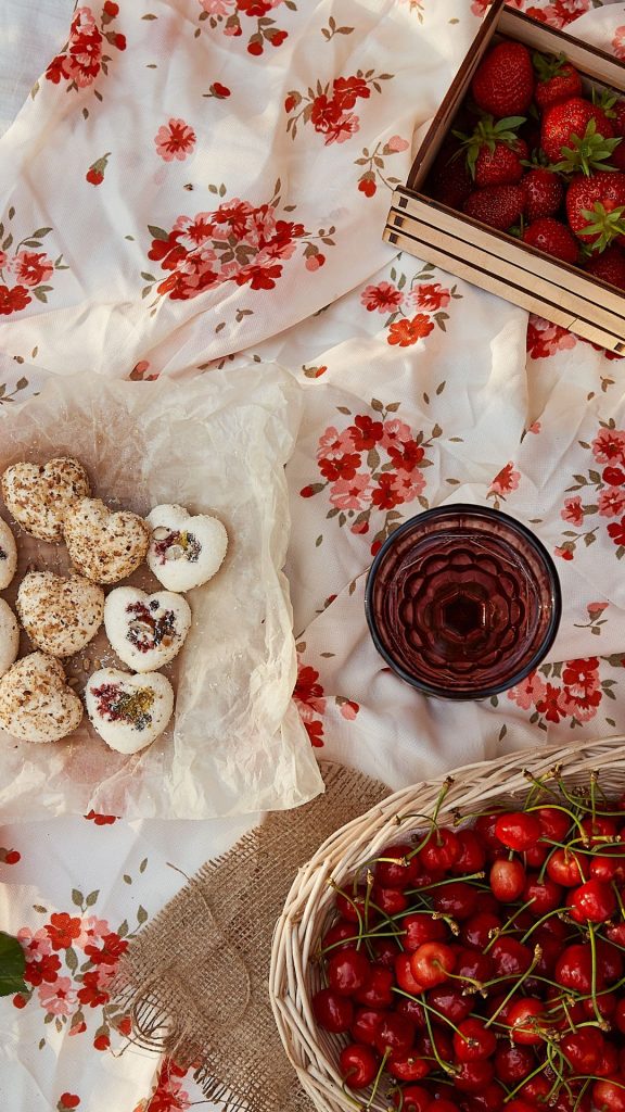 Red strawberries in wooden box with cherry filled box vintage strawberry wallpaper
