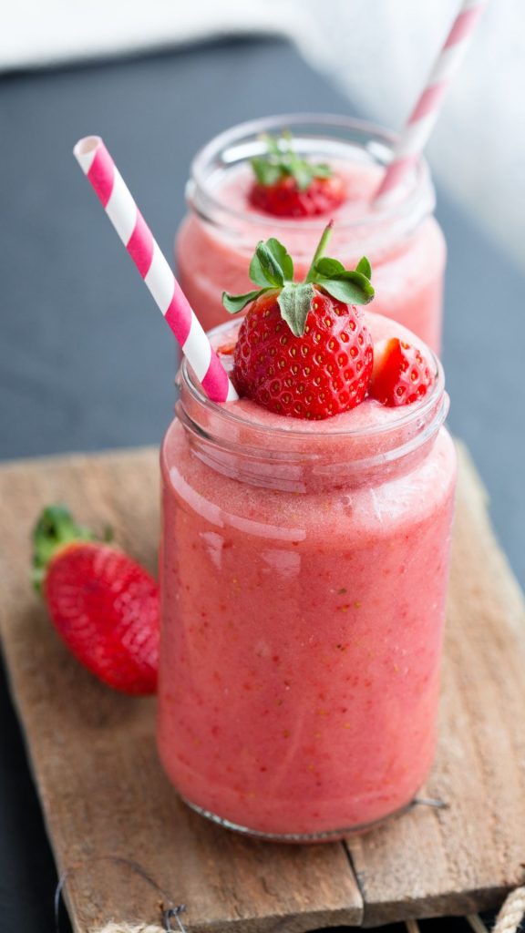 Strawberry smoothee filled glass with strawberries and straw strawberry wallpaper for I phone