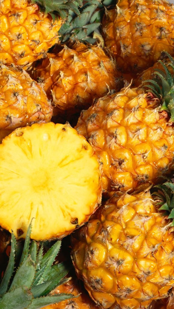 Sweet and fresh yellow pineapples still photographs Pineapple wallpaper