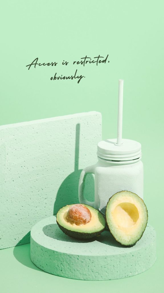 Avocados with avocado smoothee glass and light green background avocado wallpaper