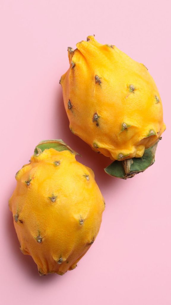 Baby pink background yellow dragon fruit wallpaper