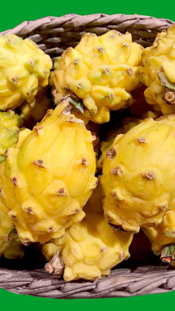 Basket of yellow dragon fruit wallpaper