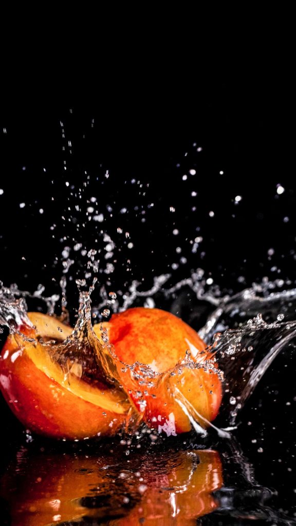 Black watery peach wallpaper