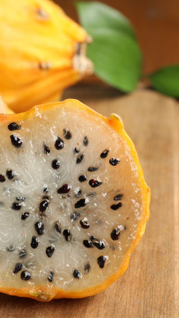 Blurred background yellow dragon fruit wallpaper