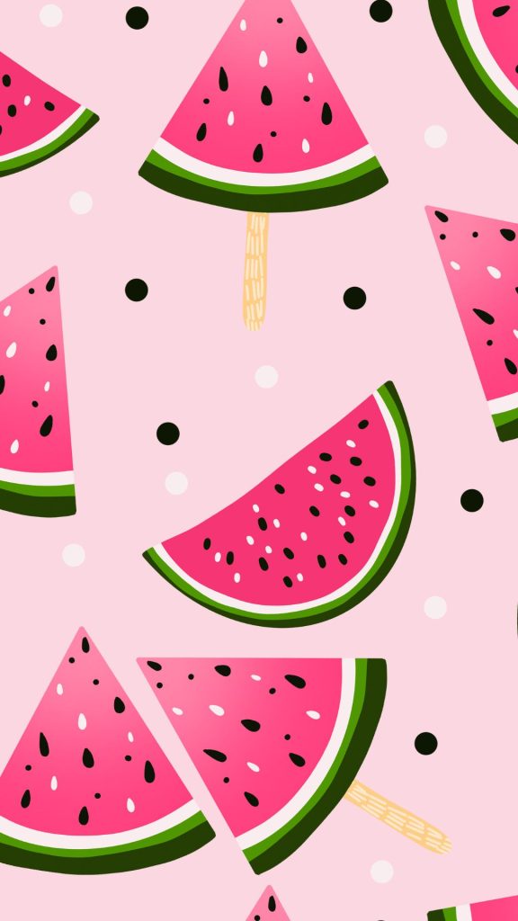 Dark pink watermelon pieces on wooden sticks with dots and pink background watermelon wallpaper