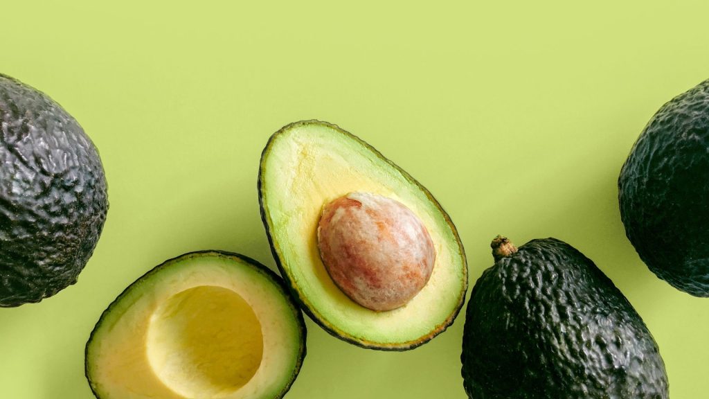 Fresh avocado picture with light green background avocado wallpaper