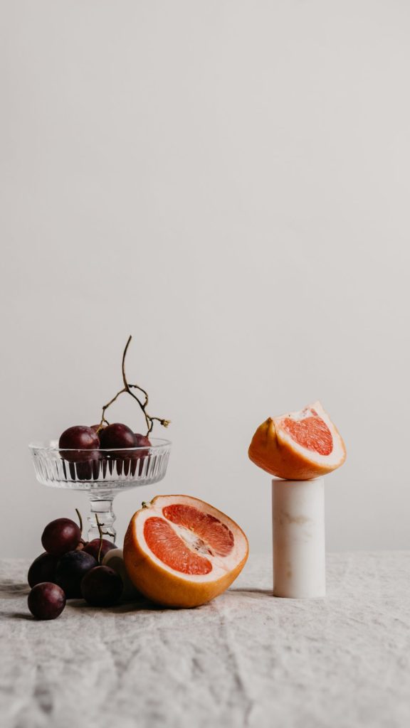 Grapes with orange purple grapes wallpaper