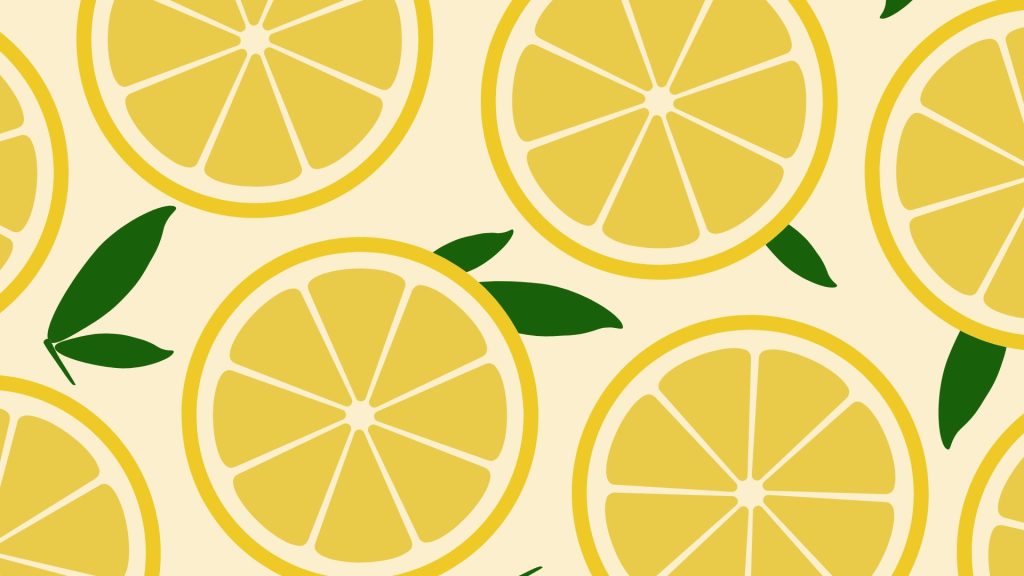 Lemons with leaves and peach background lemon wallpaper