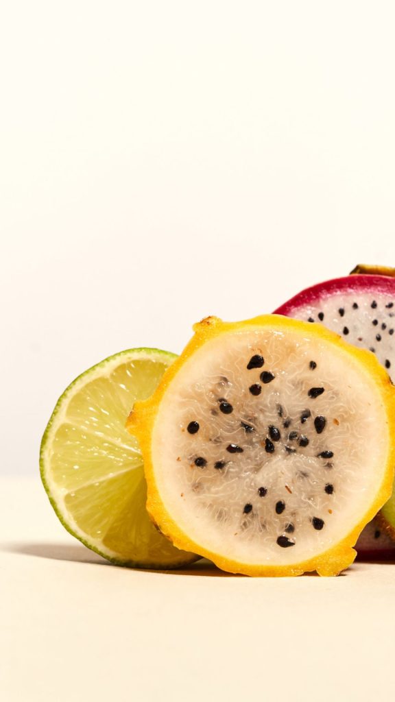 Lime and yellow dragon fruit wallpaper