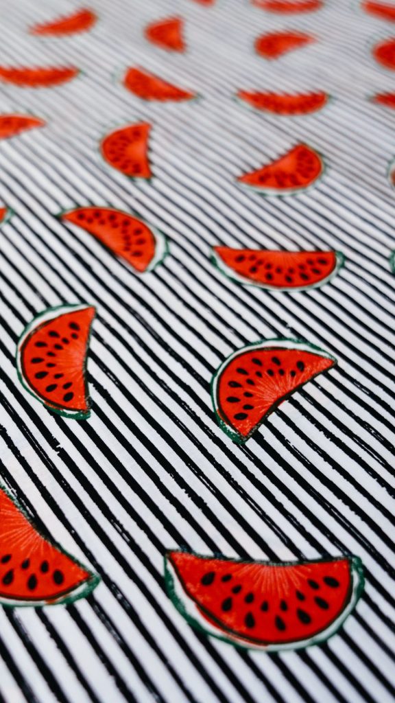 Red watermelon pieces with black and white background watermelon wallpaper