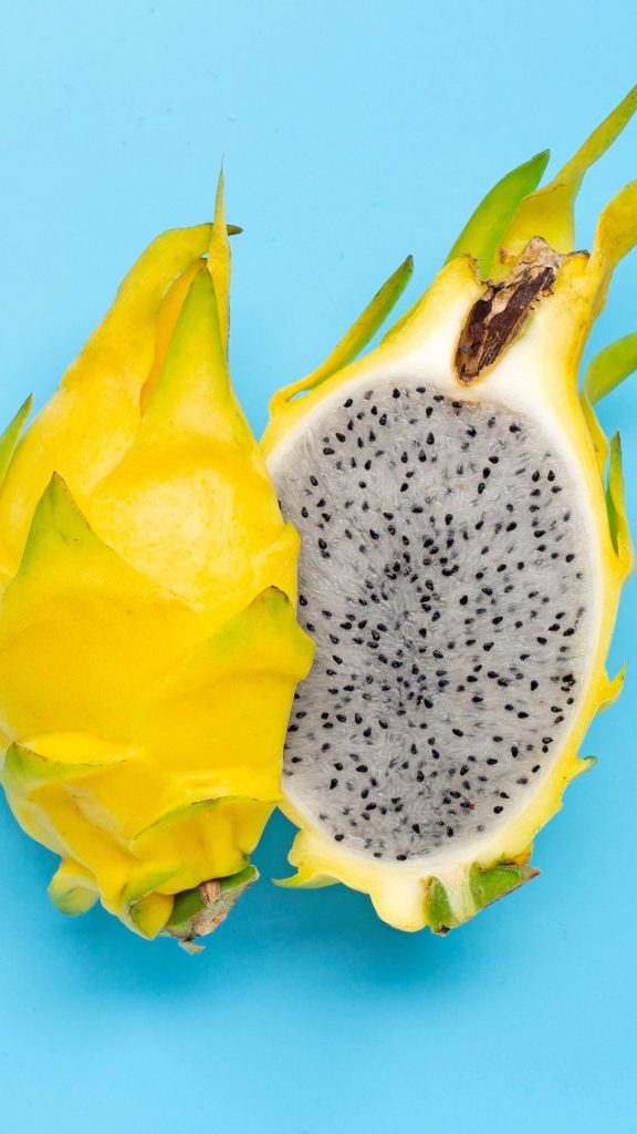 Sky background yellow dragon fruit wallpaper
