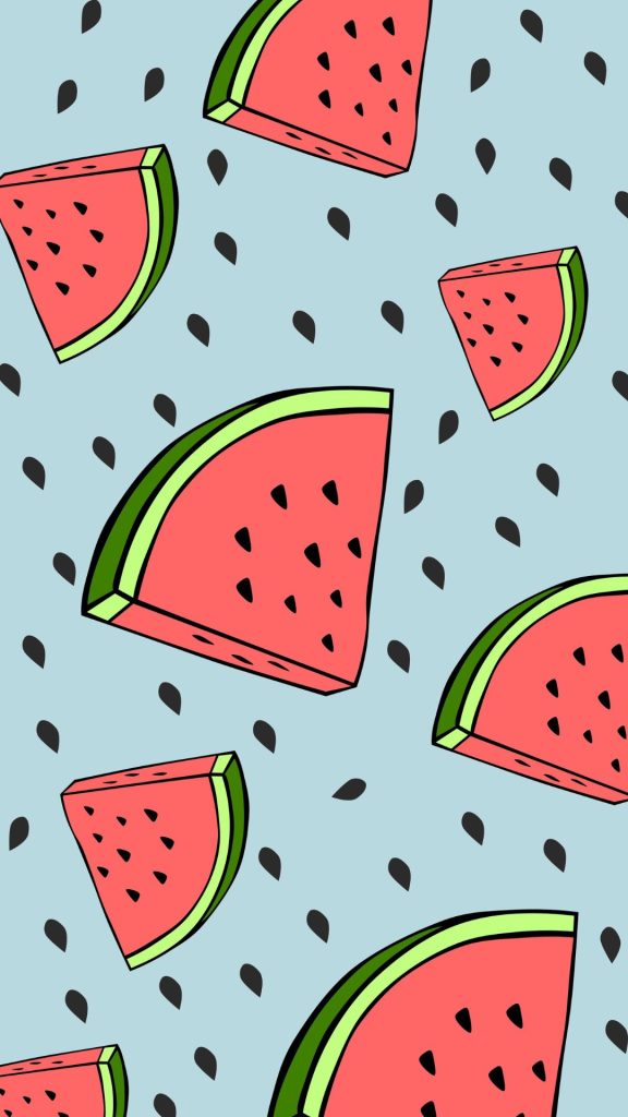 Watermelon pieces with black seeds and sky background watermelon wallpaper