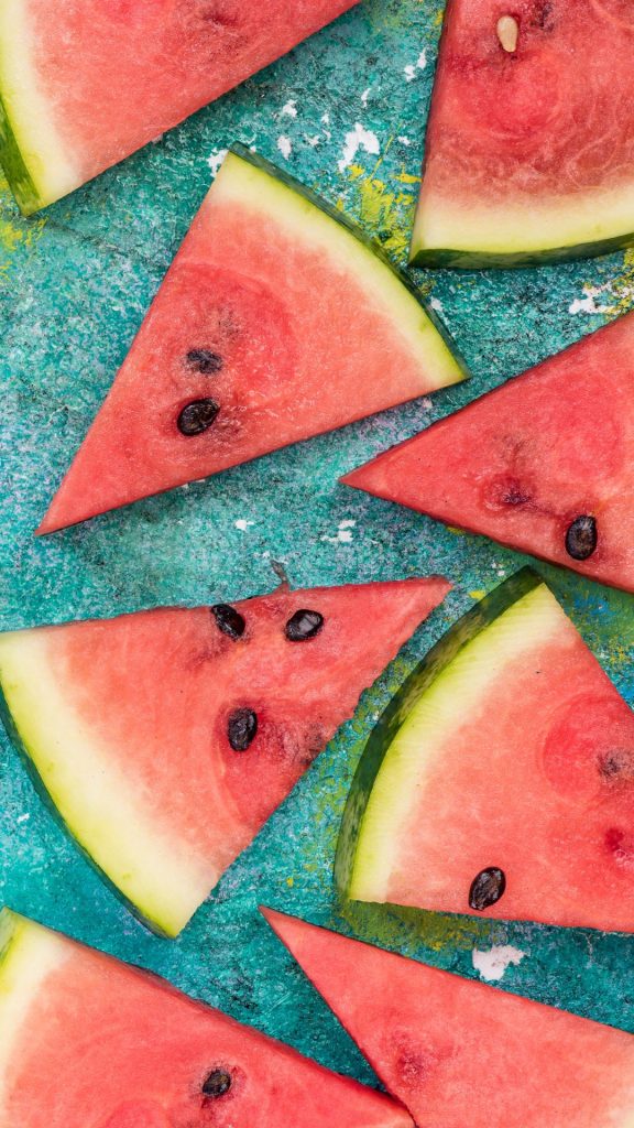 Watermelon pieces with blue background watermelon wallpaper