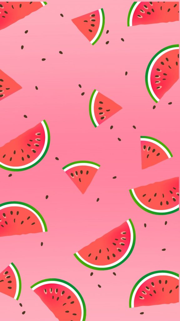 Watermelon pieces with watermelon seeds on pink background watermelon wallpaper