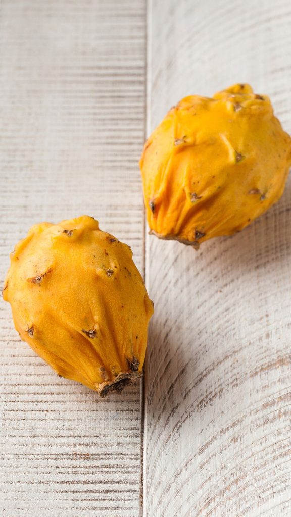 Wooden background yellow dragon fruit wallpaper