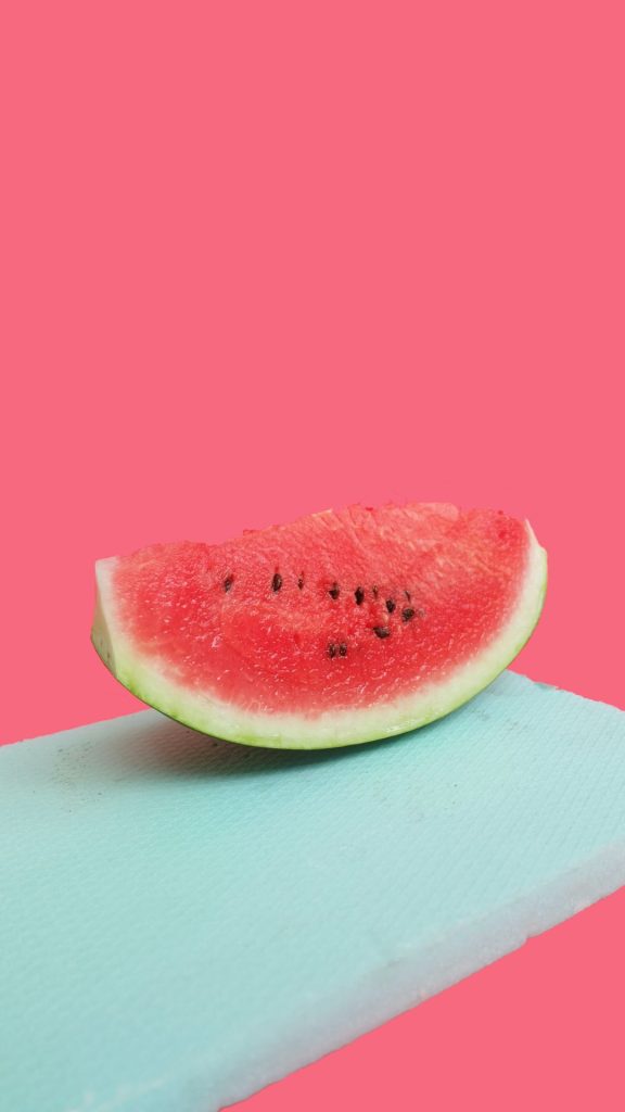 watermelon piece on sky board with pink background watermelon wallpaper
