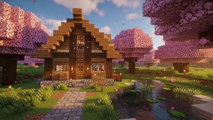 A cozy wooden Minecraft cabin named Sunset Retreat next to a lily pad pond in a cherry forest Minecraft Wallpaper
