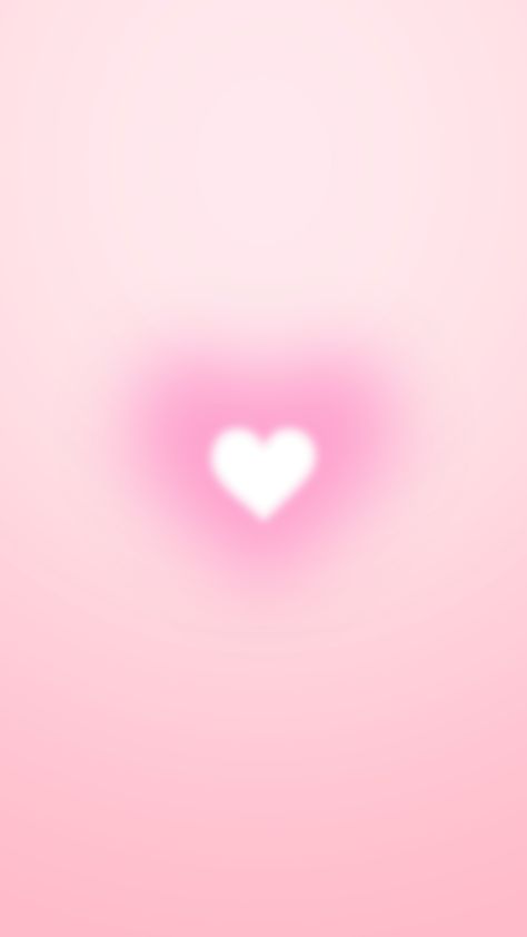 Soft aura gradient with a glowing white heart in the center pink wallpaper