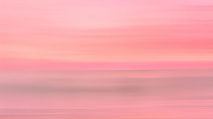 Abstract horizontal blurred landscape in soft coral and rose tones pink wallpaper