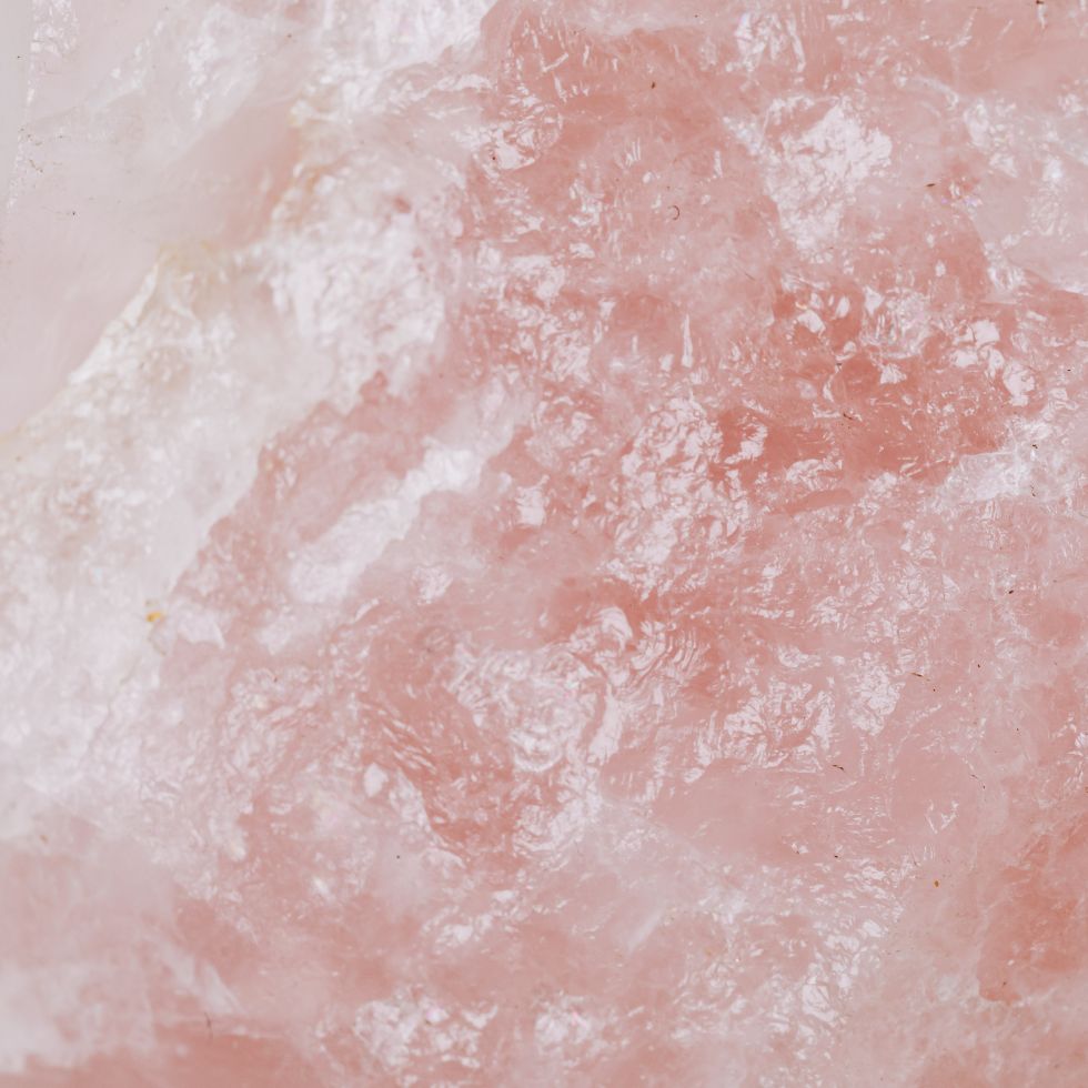 Close up macro photography of a natural pink rose quartz crystal pink wallpaper