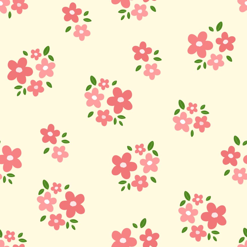 A dainty floral pattern with clusters of pink and peach blossoms and green leaves on a light cream background preppy wallpaper
