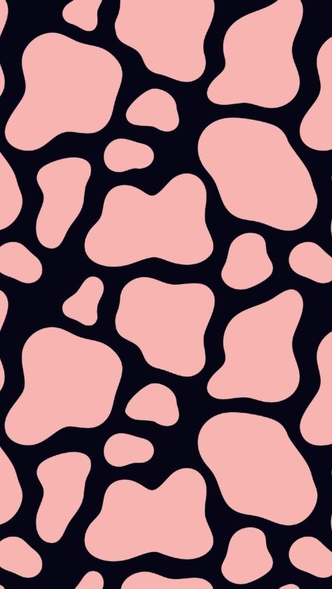 Pink cow print pattern with organic spots on a black background preppy wallpaper
