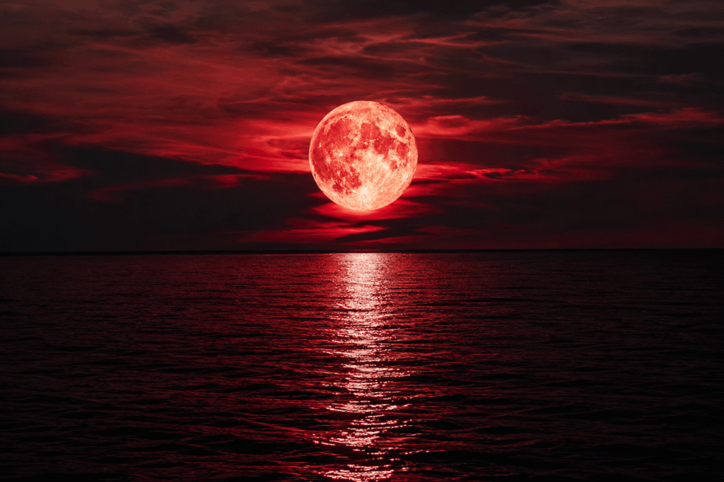 Moonlit crimson ocean at night