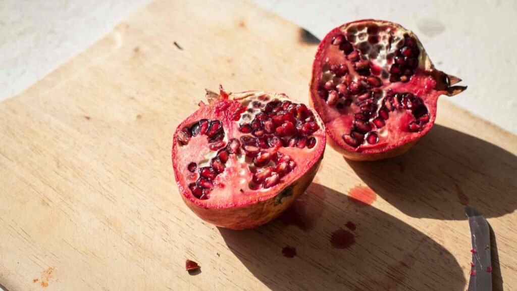 Detailed pomegranate fruit illustration wallpaper
