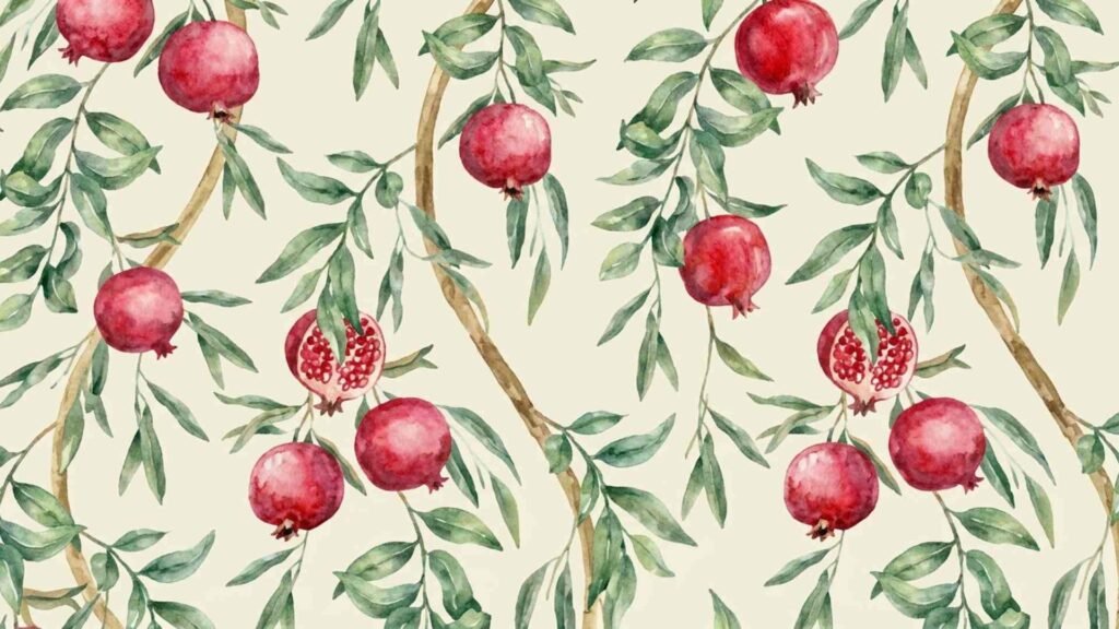 Fresh pomegranate fruit on a vibrant wallpaper