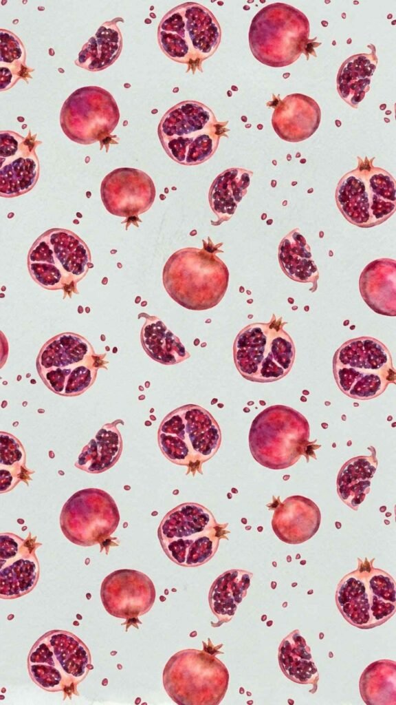 Fresh pomegranate fruit wallpaper in vibrant colors