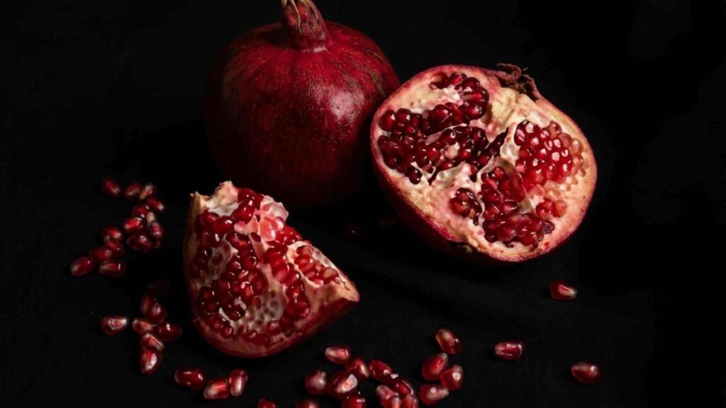 Rich red pomegranate fruit background